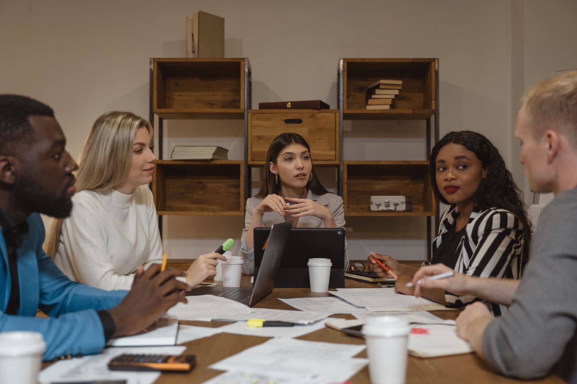 Revenue team discussing customer and pipeline information in a working session